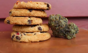 A delta 8 thc cookies and a marijuana plant.