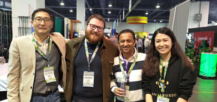 Cannapresso team standing at the Champs Trade Show in Las Vegas.